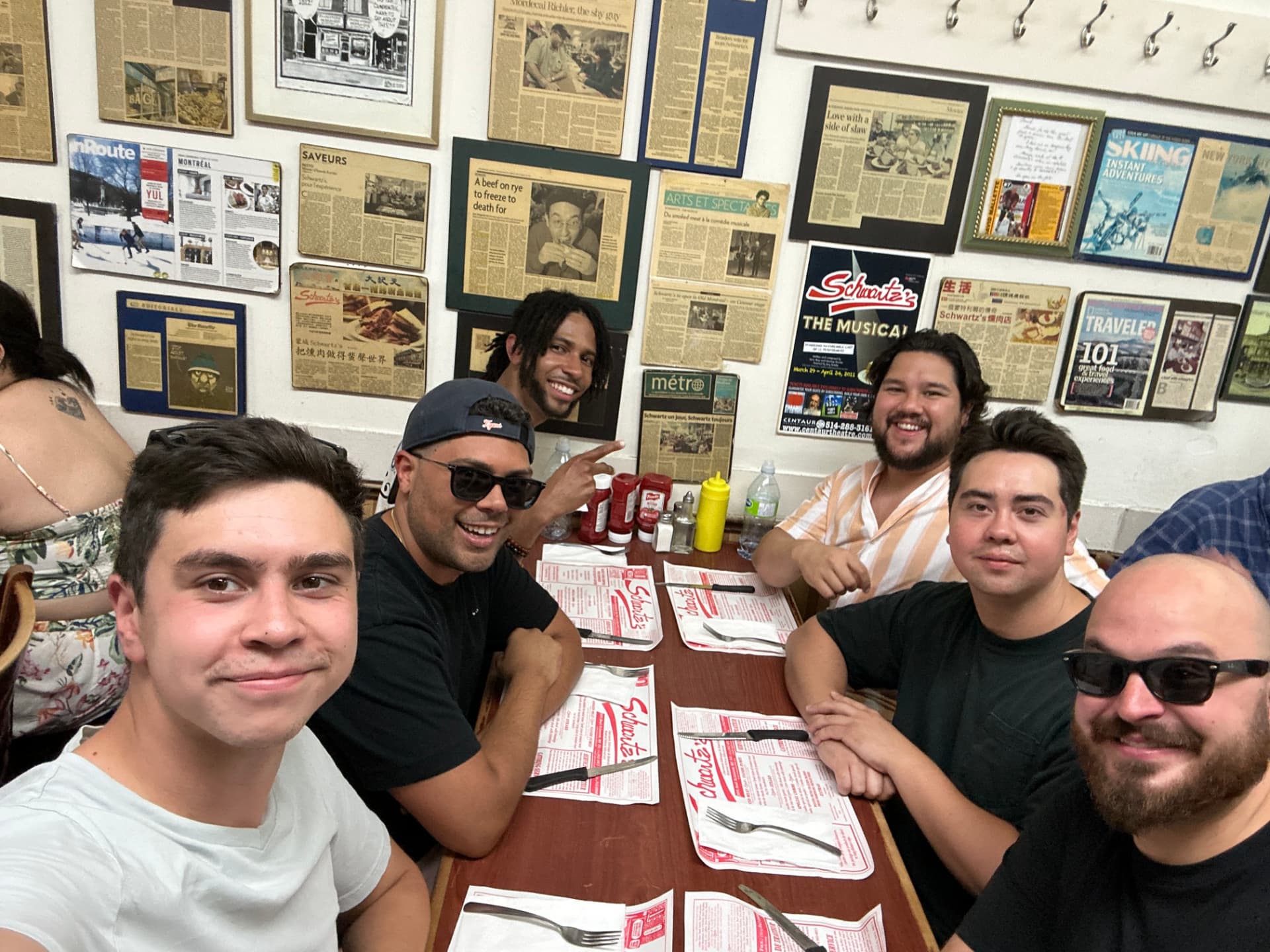 Friends gathered for a classic deli lunch