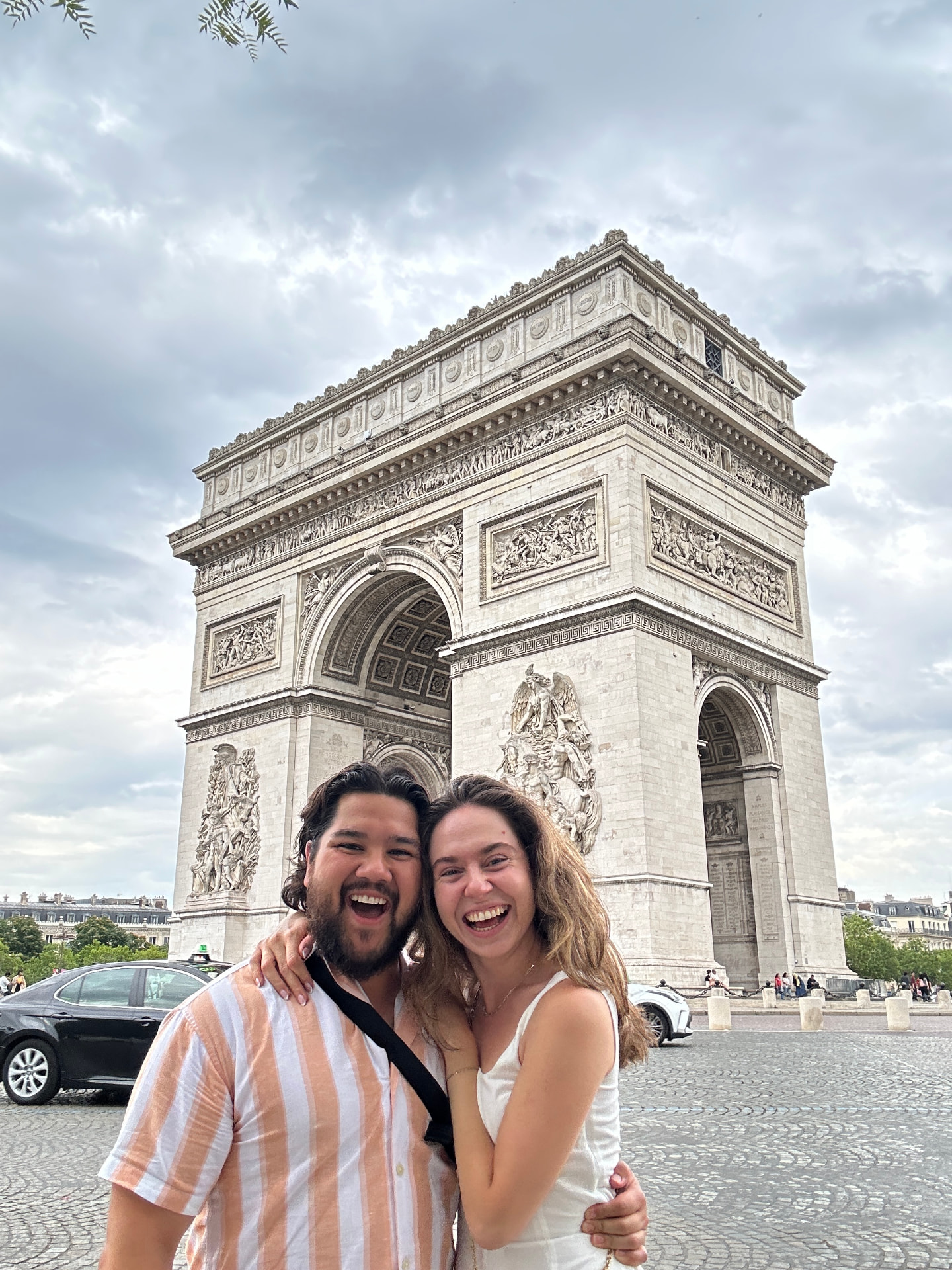 Smiling at the Arc de Triomphe